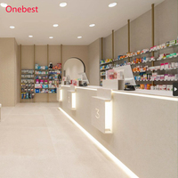 Comptoir de caisse de pharmacie en surface solide avec éclairage LED, comptoir de réception moderne pour clinique dentaire pour 3 personnes