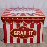 Machine de jeu interactive personnalisée « Grab It » pour défi de compétences et récompenses, idéale pour les événements de stand de kermesse, la location de fêtes et les centres de divertissement familial (FEC)
