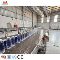 Machine de remplissage automatique de bouteilles en plastique PET personnalisée avec moteur électrique, capacité de 200 ml à 2000 ml, haute précision et économie d'énergie