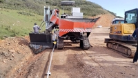 Machine automatique de construction de caniveaux en coffrage mobile pour le drainage des toits et des routes