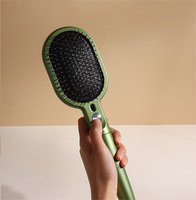 Brosse à cheveux électrique à usage domestique 5-en-1 Peigne à air chaud lisseur nettoyeur d'anions avec poignée en plastique du fabricant