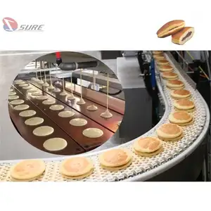 Máquina de línea para hacer tortitas de sándwich de pastel dorado japonés completamente automática Tortitas Dorayaki con máquina para hacer sándwiches