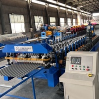 Máquina perfiladora de láminas para techos corrugados BSY IBR, controlada por PLC, con desbobinador hidráulico, incluye motor y bomba de presión.