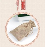 Sac en lin mini uni recyclable avec logo estampé, fourni par l'usine pour l'emballage de cadeaux culturels