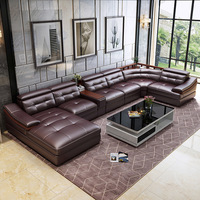 Sofa Seksional Kulit Asli Mewah Modern Eropa dengan Sandaran Kepala yang Dapat Disesuaikan dan Pengisi Daya