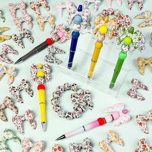 Perles en silicone à motif nœud papillon imprimées par transfert d'eau 3D - Sans BPA, qualité alimentaire pour bijoux et jouets de dentition pour bébés - Product Image 1