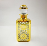 Vente en gros de bouteilles vides de parfum gravées aux UV de 250ml bouteille d'affichage de parfum plaqué or bouteille de parfum de luxe personnalisée