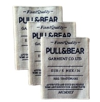 Étiquettes tissées en polyester de haute qualité personnalisées, marque propre, étiquette principale de vêtement pour les robes et les sacs
