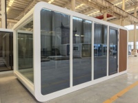 Structure préfabriquée en acier, cabine modulaire durable en forme de pomme, grande fenêtre vitrée pour poste de travail commercial.