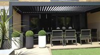 Pergola moderne en aluminium imperméable avec toit à lames motorisées, gazebo de jardin
