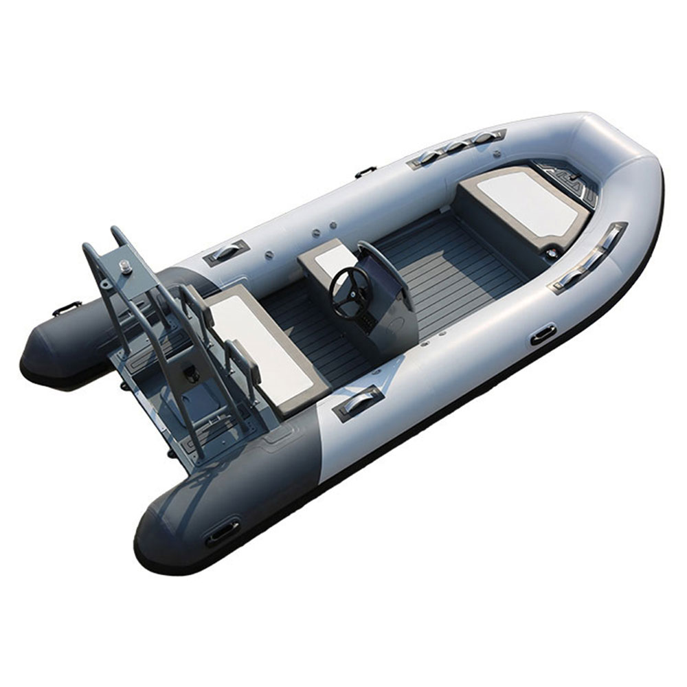 rigid inflatable boat launching through surf