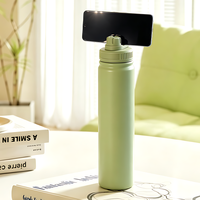 Bouteille d'eau sport isotherme en acier inoxydable thermolaqué 25 oz avec couvercle à anneau magnétique pour support de téléphone, personnalisable avec logo, idéale pour les voyages et la gym