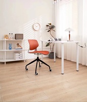 Chaise de bureau pivotante ergonomique grise