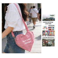 Nouveau sac à bandoulière en toile pour femmes avec logo personnalisé imprimé en forme de cœur d'amour avec pendentifs' anneau en métal Mode féminine Beauté