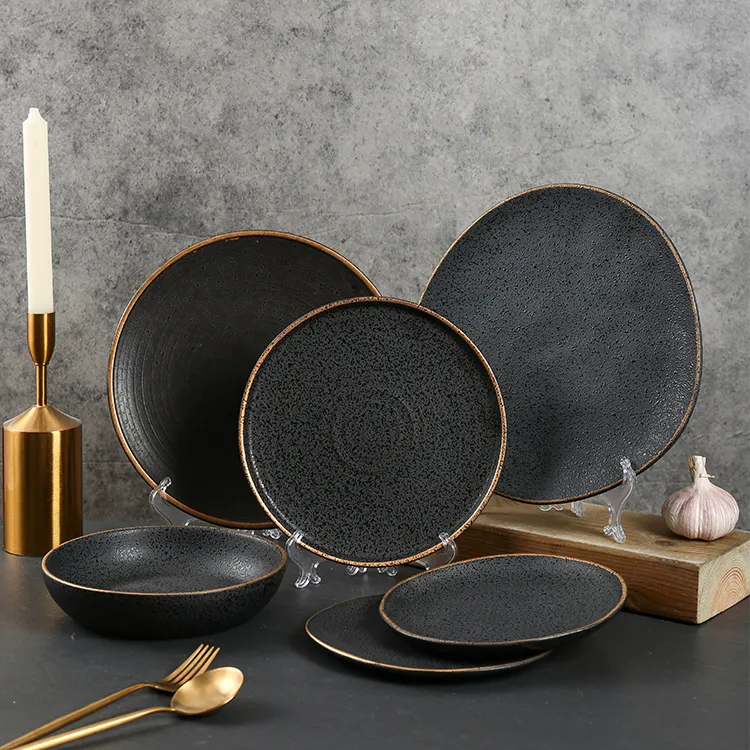 Herstellung von großhandel maßgeschneiderte moderne luxus dekorative keramikgeschirr und teller schwarz gold essgeschirr für restaurant