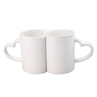 Ventes en gros de tasses à lait en céramique en forme de cœur pour couples, blancs à sublimer, 11 oz, style américain, cadeau d'affaires