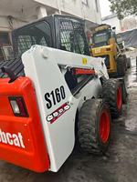 Mini-chargeur d'occasion 2 tonnes Bobcat S160 Chargeur compact à chenilles à roues automatique S160 pour la neige, les déchets de construction, faible consommation