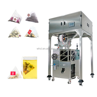 Machine de remplissage et d'emballage automatique à 4 balances électroniques Pyramide Sachet à base de plantes pour thé vert avec étiquette Triangle Feuilles de thé Sachet