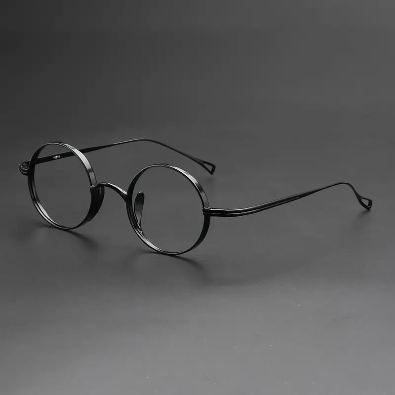 Reines Titan rundes berühmtes Design Bronze hand gefertigte Vintage Brille optischen Rahmen