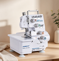 Machine à surjeter mini JUKKY 4-434D très appréciée, conception surjeteuse à double aiguille, fonctionnement à grande vitesse, alimentée par un moteur métallique robuste