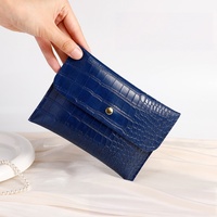 Pochette en cuir PU personnalisée avec logo pour rouge à lèvres, lunettes de soleil, organisateur de bijoux, sac d'emballage avec boutons-pression