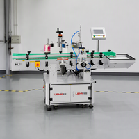 Machine d'étiquetage automatique de bouteilles de boissons à haute productivité avec codage de date et étiquetage par autocollant