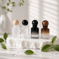 Prix d'usine, logo personnalisable, flacons de parfum en verre cylindriques de 50 ml et 100 ml