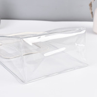 CSMD Fabricant chinois Vente en gros Matériau en PVC transparent Nouvelle poignée Sac à provisions en plastique à poignée blanche pour l'emballage des vêtements