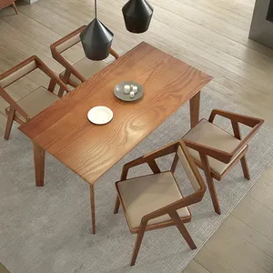 Silla de comedor de cuero con brazo de madera maciza, mueble nórdico clásico para el hogar, venta al por mayor