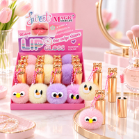 Huile à lèvres en tube métallique doré, brillant à lèvres avec porte-clés pompon oiseau mignon, fabrication OEM personnalisée