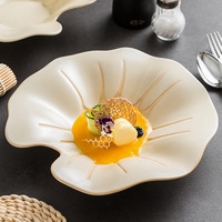 Assiette en céramique de luxe en forme de feuille de lotus, bol à dessert irrégulier créatif pour hôtel, restaurant, service de table gastronomique
