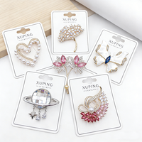 Broches XUPING en gros pour cadeaux de mariage, accessoires de mode papillon, fleur, perle, grande épingle, broches animales pour femmes