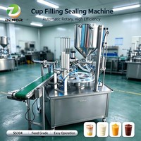 Machine de remplissage et de scellage automatique pneumatique à haute productivité pour les boissons au lait, au yaourt et autres boissons en gobelets en plastique pour cartons