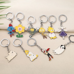 Nouveau porte-clés pendentif de personnage de dessin animé légendaire avec motif Undertale Little Flower Dog pour cadeaux d'affaires - Product Image 1