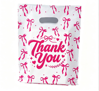 Sacs de remerciement en plastique HDPE HOYO avec imprimé nœud rose et poignée découpée en forme de cœur, modèle 80260, pour les magasins de détail et les boutiques