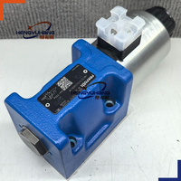 Vanne de commande directionnelle hydraulique R901278772 4WE10C5X/EG24N9K4/M NG10 CETOP 5, électrovanne 24V DC 350 bars avec commande manuelle
