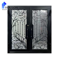 Porte d'entrée de luxe en fer forgé avec décorations artistiques, verre dépoli et sécurité renforcée pour villa