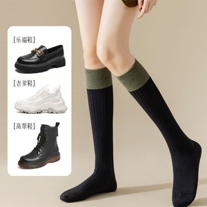 Chaussettes hautes pour femmes, couleur unie, en polyester, chaudes, pour l'automne et l'hiver, style jeune - Product Image 1