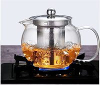 Théière en verre borosilicate soufflé à la main, résistante à la chaleur, compatible avec les plaques de cuisson, 800 ml, avec infuseur en acier inoxydable pour thé en feuilles.