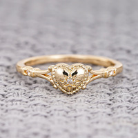 Bague en forme de cœur plaquée or 18 carats, en acier inoxydable, résistante à l'eau et inaltérable, de la marque Fanhua.
