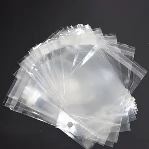 Toptan biyobozunur şeffaf şeffaf kendinden yapışkanlı selofan plastik OPP çanta mühür kapak