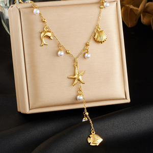 Collar Lariat <span class=keywords><strong>de</strong></span> Acero Inoxidable 316L Dorado con Colgante en Y <span class=keywords><strong>de</strong></span> Perla, Delfín, Estrella <span class=keywords><strong>de</strong></span> Mar y Concha, Joyería para Mujer, Venta al por Mayor, Personalizado OEM - Product Image 1