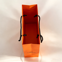 Emballages de bijoux de haute qualité pour boutiques, sacs cadeaux personnalisés pour bracelets, boucles d'oreilles, colliers, bagues, sacs en papier parfumé orange