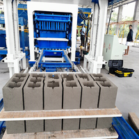 Machine automatique QT4-15 pour la fabrication de pavés, de blocs creux et de briques en béton, ciment, sable et cendres volantes, à bas prix