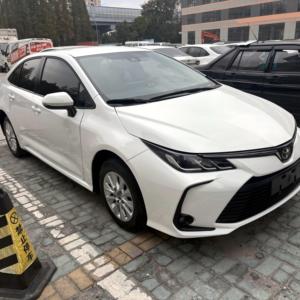 Toyota <span class=keywords><strong>Corolla</strong></span> d'occasion 2022, <span class=keywords><strong>blanche</strong></span>, 30 000 km, boîte manuelle, conduite à gauche, pneus R15, sièges en tissu, intérieur foncé, essence, voiture en stock - Product Image 4
