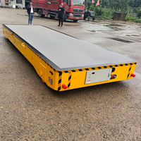 Carro de transferencia eléctrico AGV de 10 toneladas, robot de almacén alimentado por batería, vehículo de carro de transporte pesado con control remoto