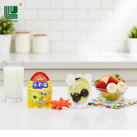 Vente en gros de chocolats solides miniatures personnalisés en forme d'œuf, jouets de dessin animé pour enfants, emballage bleu personnalisé, collations au lait, confiserie LUYUAN