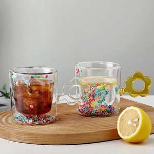 Taza <span class=keywords><strong>de</strong></span> <span class=keywords><strong>café</strong></span> <span class=keywords><strong>de</strong></span> vidrio <span class=keywords><strong>de</strong></span> borosilicato alto <span class=keywords><strong>de</strong></span> color transparente <span class=keywords><strong>de</strong></span> 250ml con mango <span class=keywords><strong>de</strong></span> flor taza <span class=keywords><strong>de</strong></span> <span class=keywords><strong>arena</strong></span> movediza <span class=keywords><strong>de</strong></span> doble cap - Product Image 5