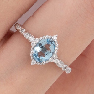 Bague de fiançailles en argent sterling S925 avec un design élégant et vintage, sertie d'une pierre ovale en aquamarine, style fleur, vente en gros - Product Image 5