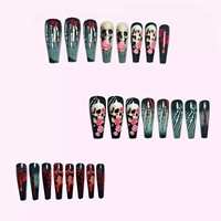 Nouvel ensemble de 24 faux ongles longs de style français sur le thème d'Halloween, avec motifs de griffes de fantôme, de roses et de crânes, pour un look effrayant.
